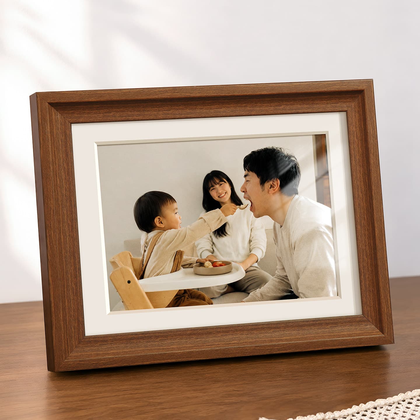 A signature wooden photo frame with a family portrait